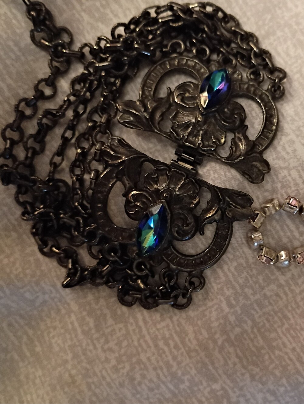 Victorian-Style Black Necklace with Iridescent Blue-Green Stones